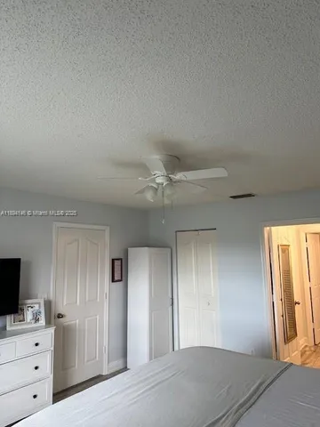a view of a livingroom with an empty space and a window