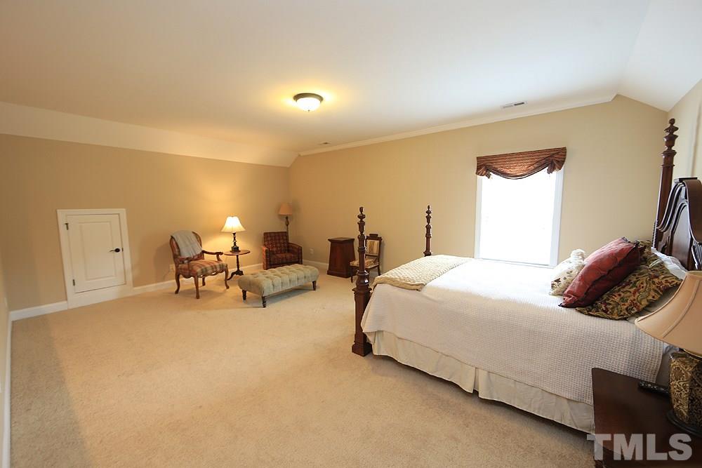 8448 Lentic Court Raleigh, NC 27615 - Photo 21 of 25 Plenty of space for whatever you need...rec room, craft space, extra TV room or bedroom.