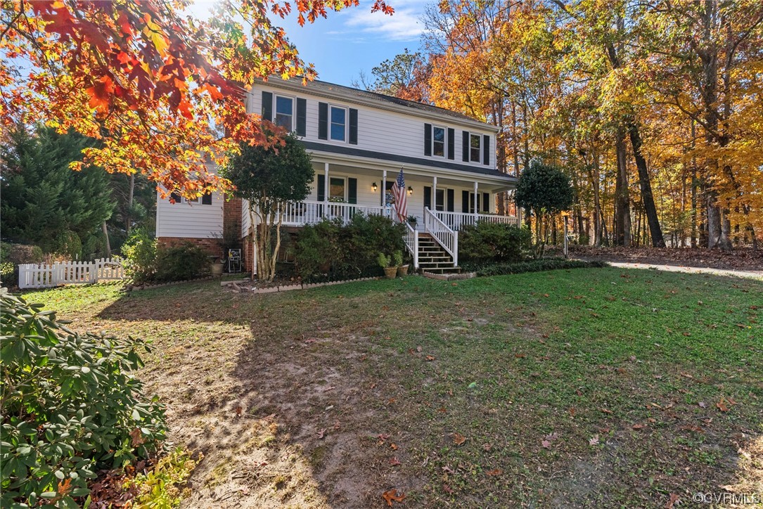 3319 Ludgate Road Chester, VA 23831 - Photo 2 of 47 a front view of a house with a yard