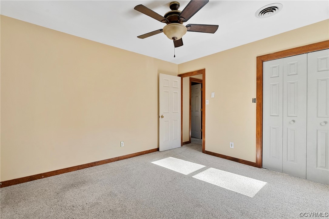 3319 Ludgate Road Chester, VA 23831 - Photo 25 of 47 an empty room with ceiling fan and window
