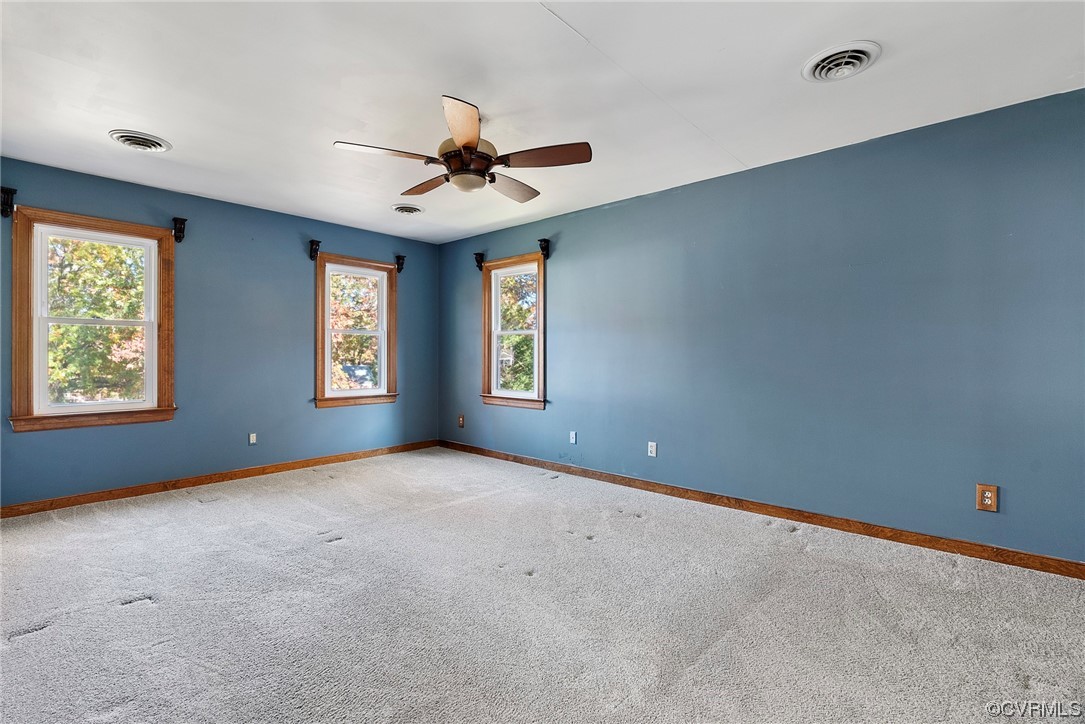 3319 Ludgate Road Chester, VA 23831 - Photo 27 of 47 an empty room with windows and fan