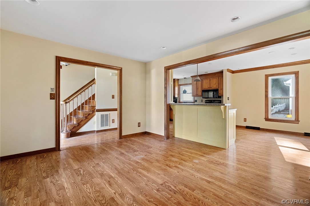 3319 Ludgate Road Chester, VA 23831 - Photo 7 of 47 a view of a kitchen with wooden floor and a kitchen space