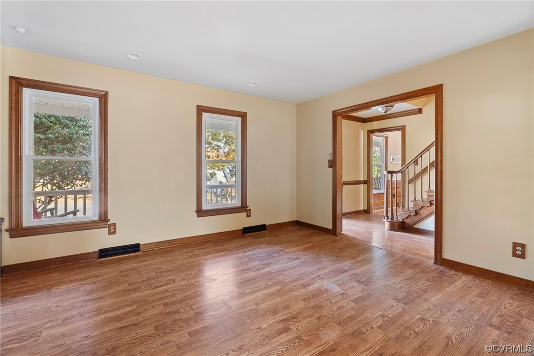 3319 Ludgate Road Chester, VA 23831 - Photo 8 of 47 an empty room with wooden floor and windows