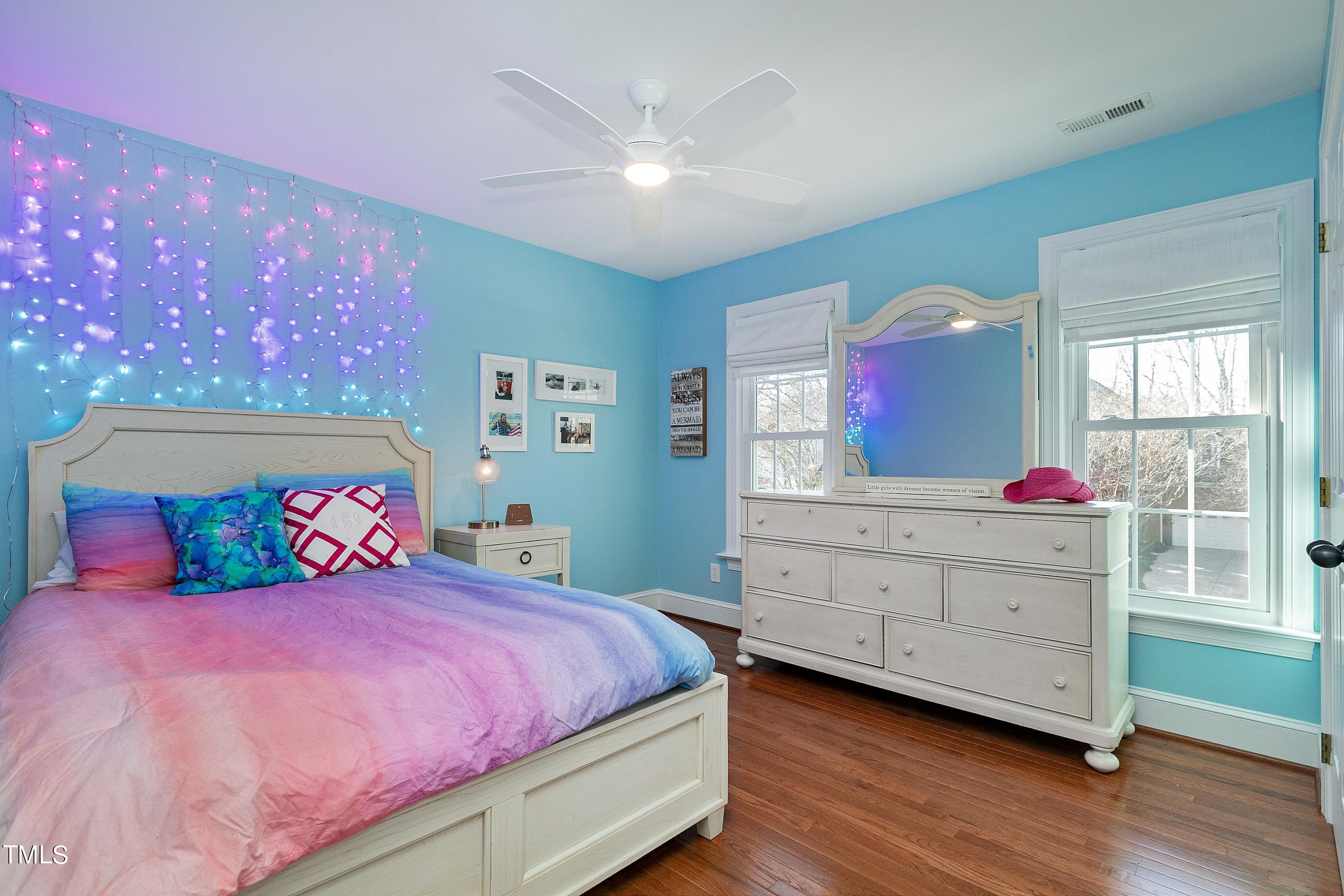8928 Windjammer Drive Raleigh, NC 27615 - Photo 24 of 44 Spacious 2nd bedroom with wood built-in shelving in closet