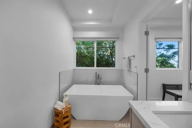 a room with a bed and a window