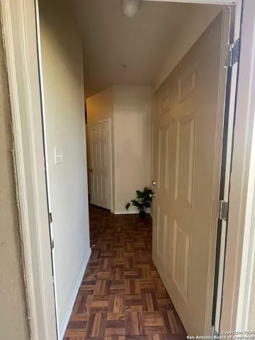 a view of a bathroom with a sink and a shower