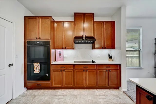 a bed room with a bed and a window