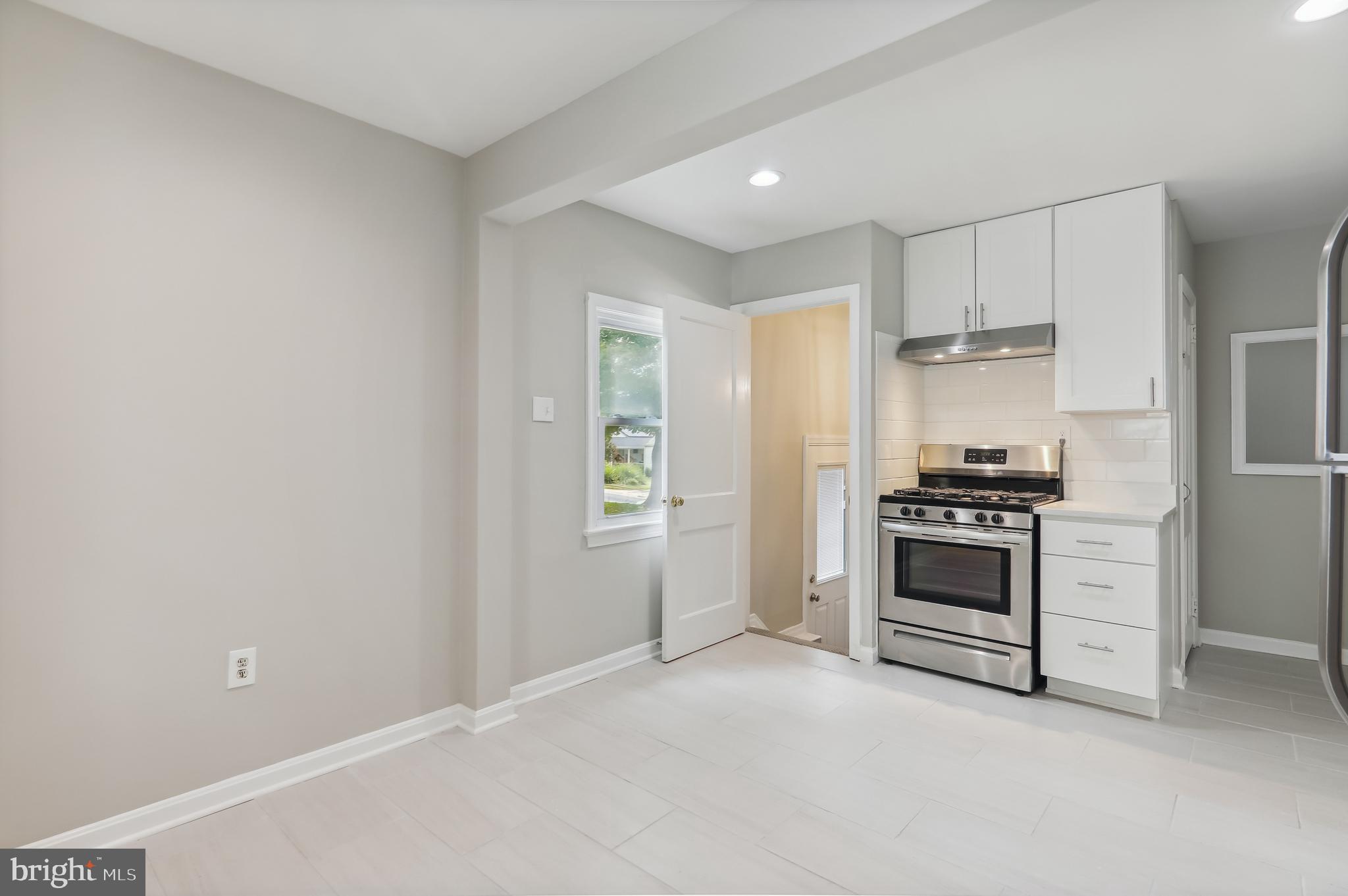 4413 Sigsbee Road Silver Spring, MD 20906 - Photo 12 of 36 Kitchen w/ Large Eat-in /Dining space