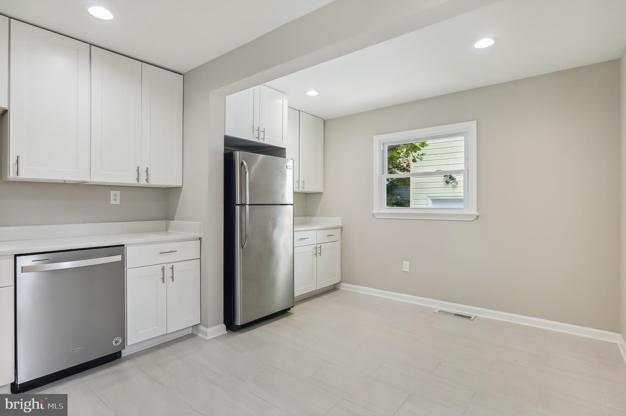 4413 Sigsbee Road Silver Spring, MD 20906 - Photo 10 of 36 Kitchen w/ Large Eat-in /Dining space