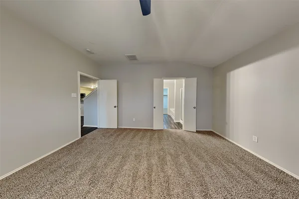 a view of an empty room with window