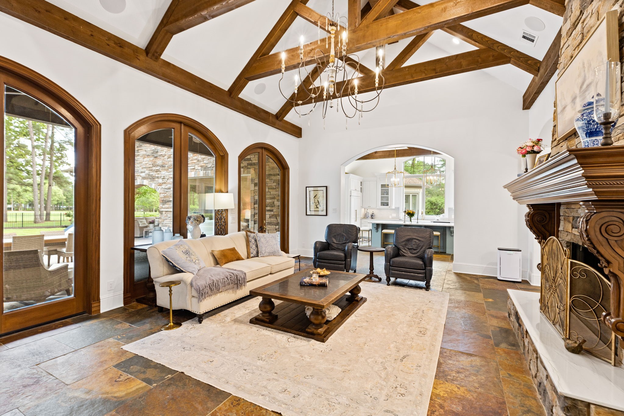 38223 Windy Ridge Trail Magnolia, TX 77355 - Photo 12 of 48 Another view of this fabulous family room looking towards the kitchen. The interior of the house has been freshly painted. Breathtaking views of the backyard and 4th fairway through these massive windows.