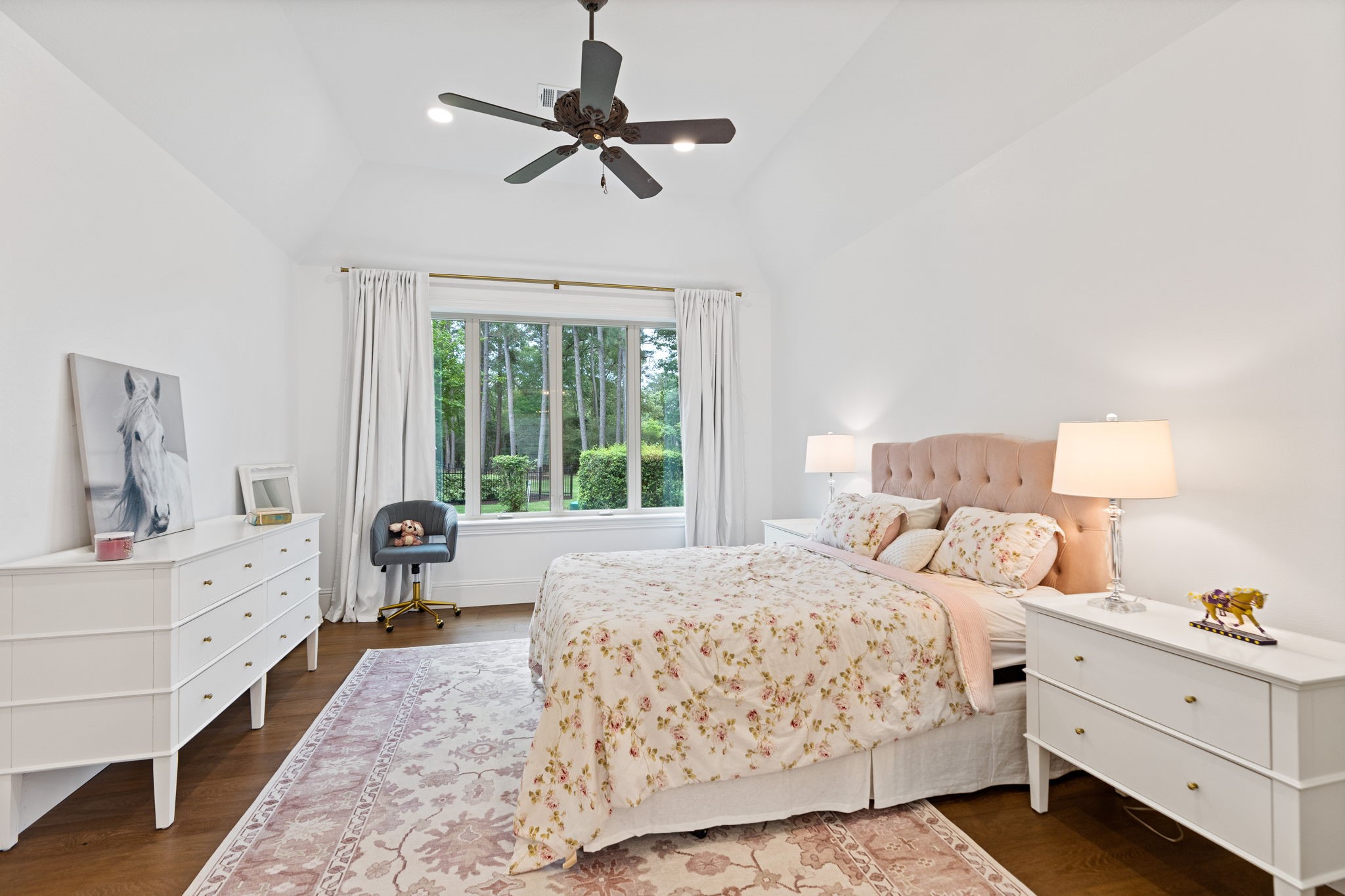 38223 Windy Ridge Trail Magnolia, TX 77355 - Photo 30 of 48 a bedroom with a bed and a dresser