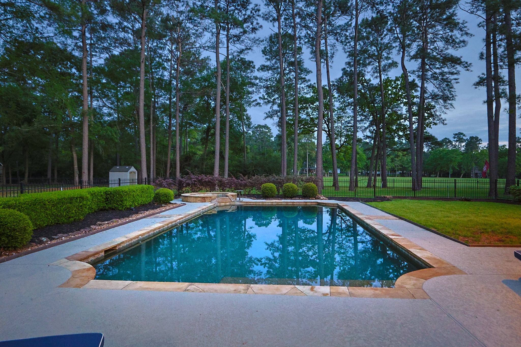 38223 Windy Ridge Trail Magnolia, TX 77355 - Photo 38 of 48 Sunset view of the pool that overlooks the 4th fairway of the golf course.