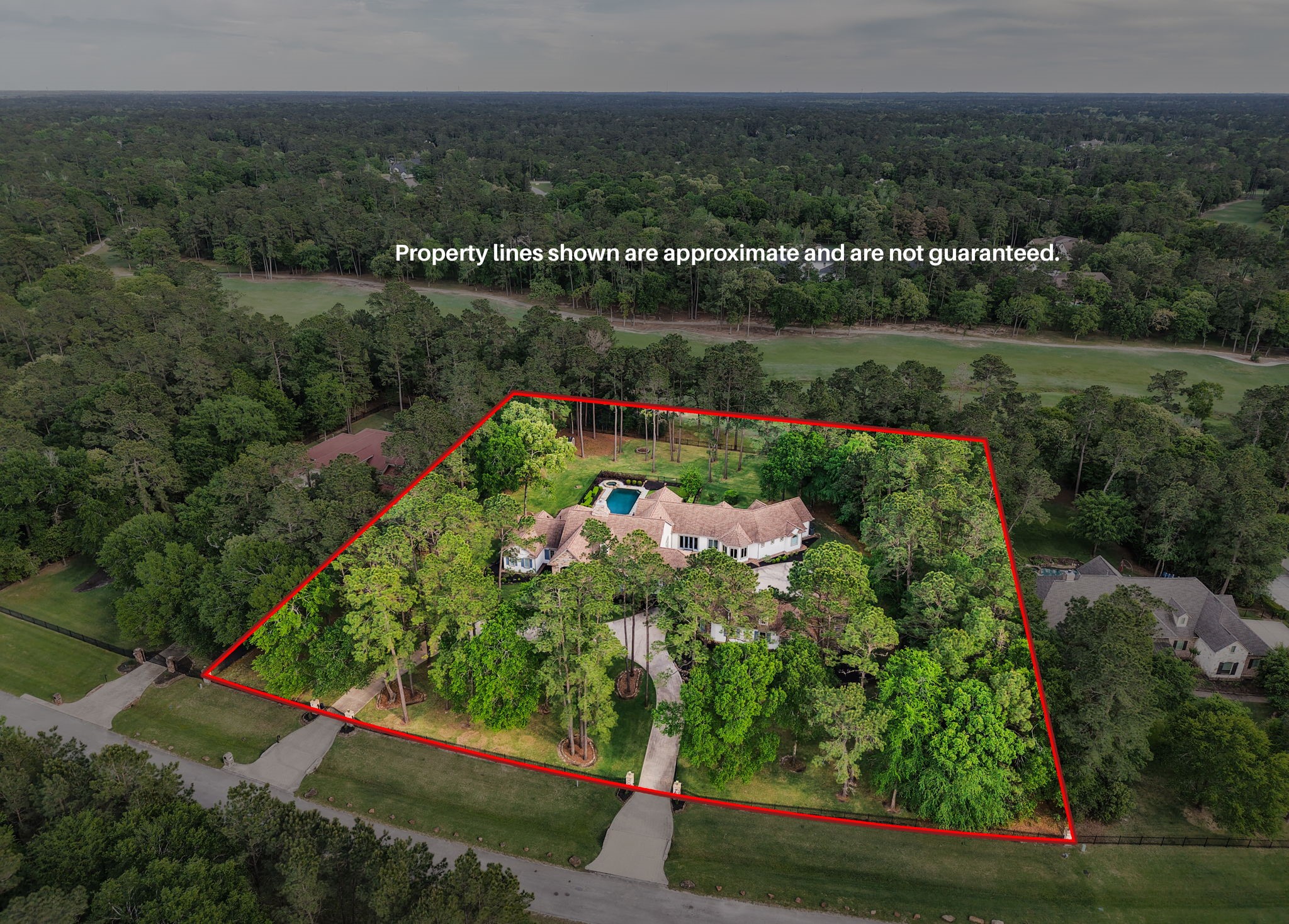 38223 Windy Ridge Trail Magnolia, TX 77355 - Photo 44 of 48 an aerial view of lake and residential houses with outdoor space