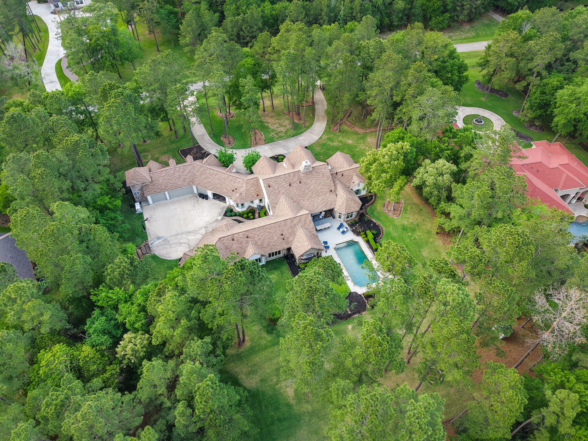 38223 Windy Ridge Trail Magnolia, TX 77355 - Photo 47 of 48 an aerial view of a house with a yard
