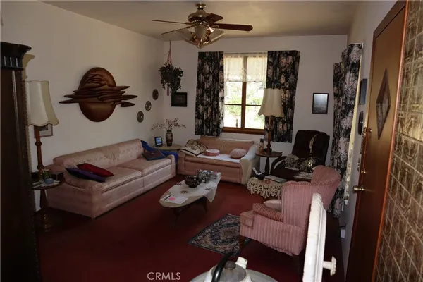 a kitchen with stainless steel appliances a stove and a microwave