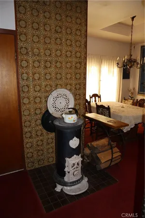 a kitchen with stainless steel appliances granite countertop a stove and a microwave
