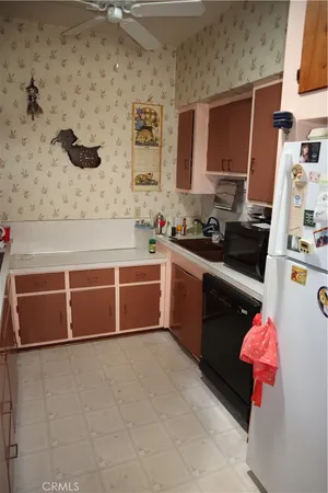 a bathroom with a sink toilet and mirror