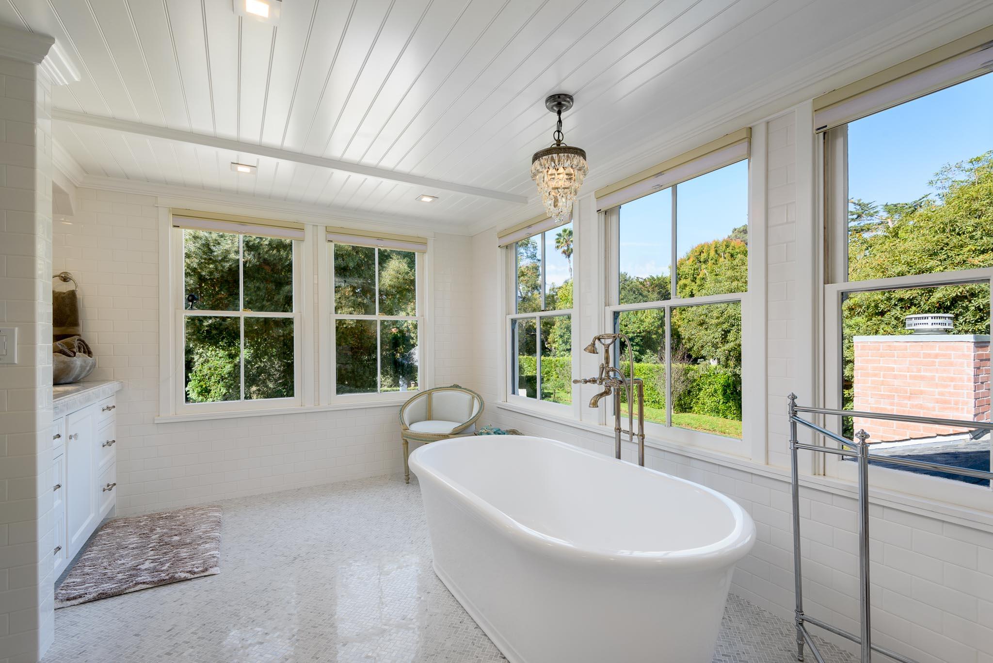 167 Pomar Lane Montecito, CA 93108 - Photo 15 of 35 a bathroom with a sink a bathtub and window