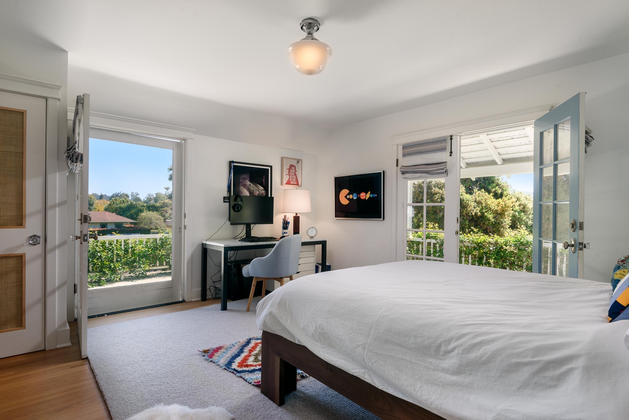 167 Pomar Lane Montecito, CA 93108 - Photo 16 of 35 a bed sitting in a spacious bedroom next to a window