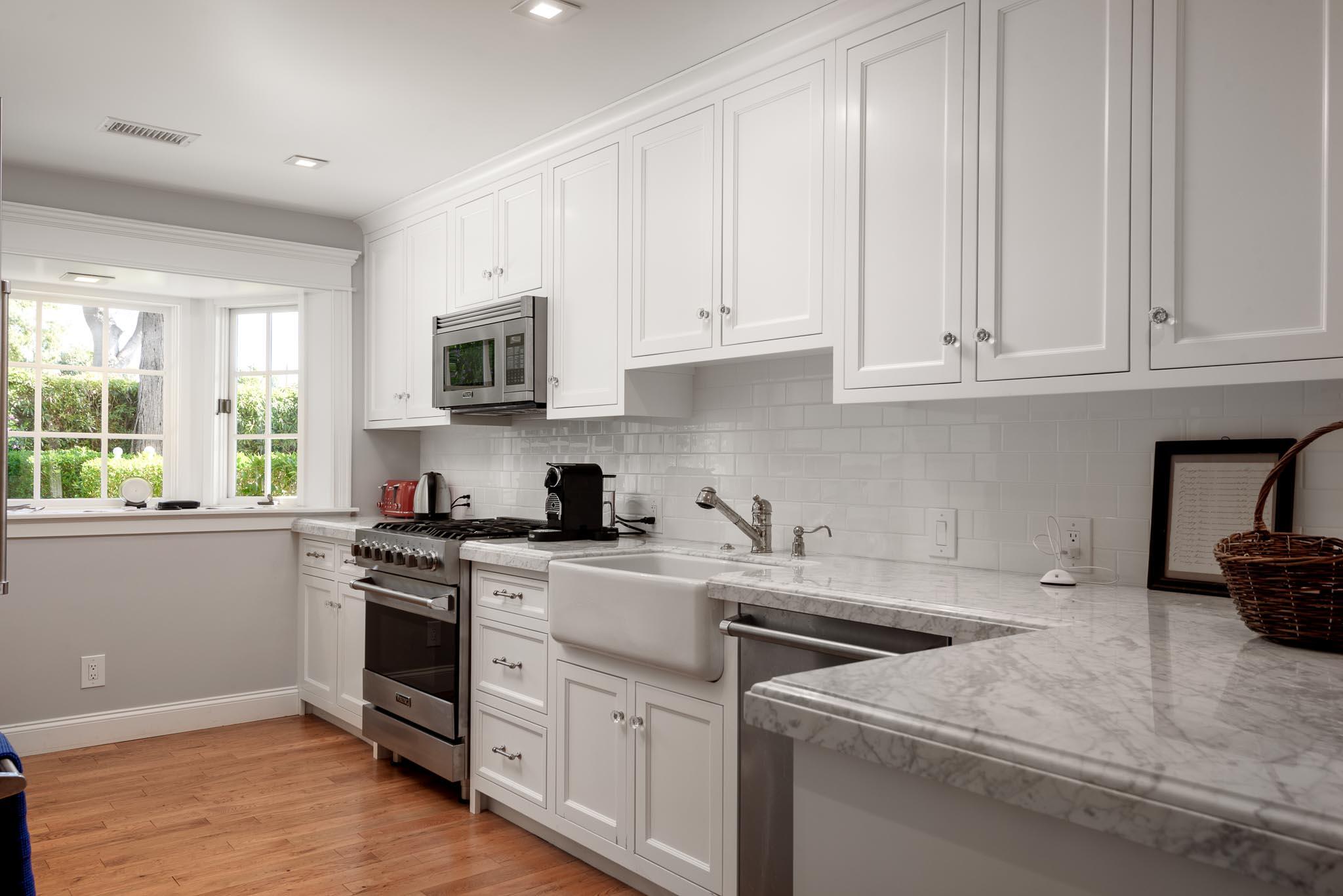 167 Pomar Lane Montecito, CA 93108 - Photo 24 of 35 a kitchen with cabinets appliances a sink and a window