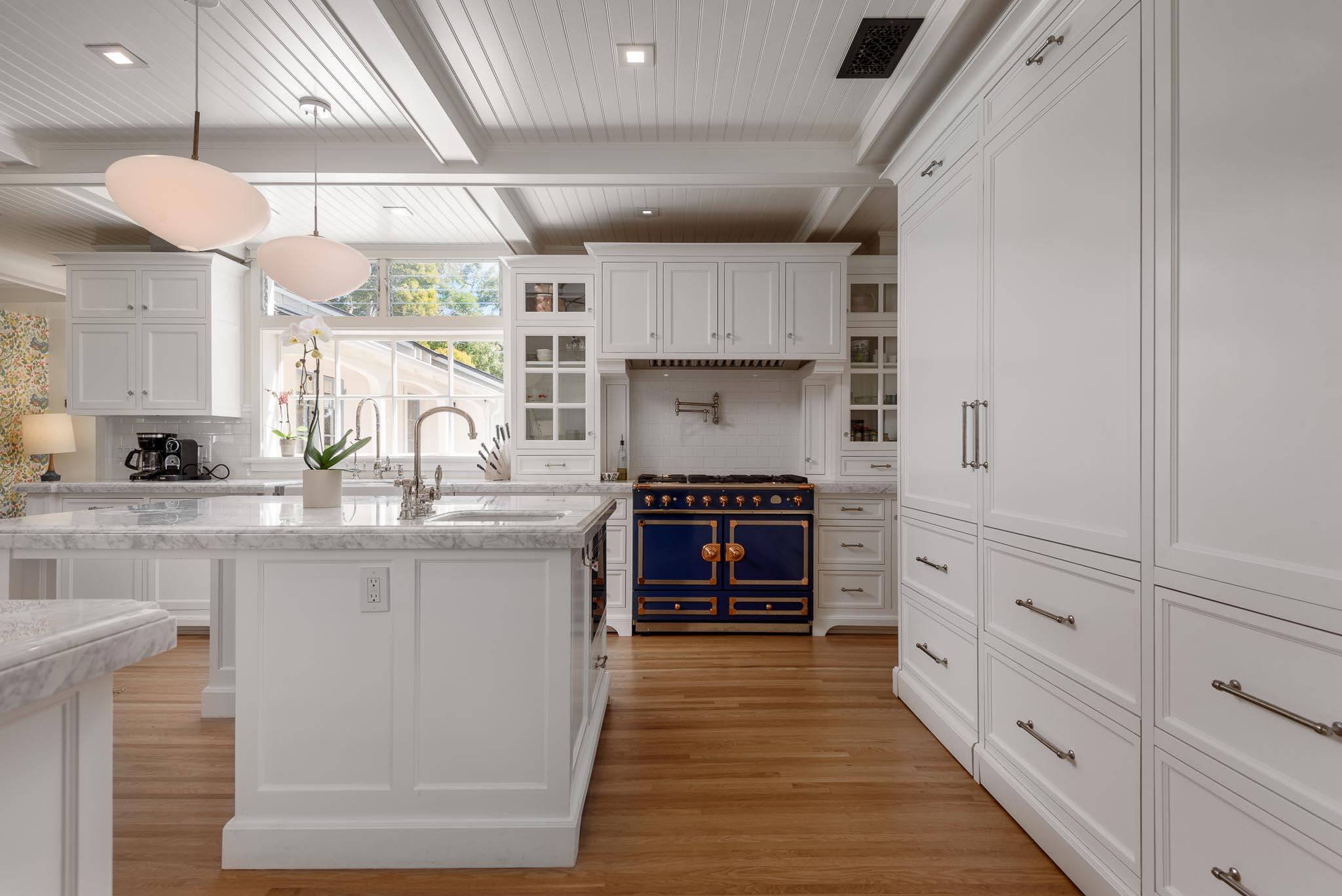 167 Pomar Lane Montecito, CA 93108 - Photo 8 of 35 a kitchen with granite countertop a refrigerator and a stove