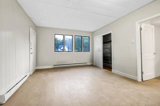 an empty room with windows