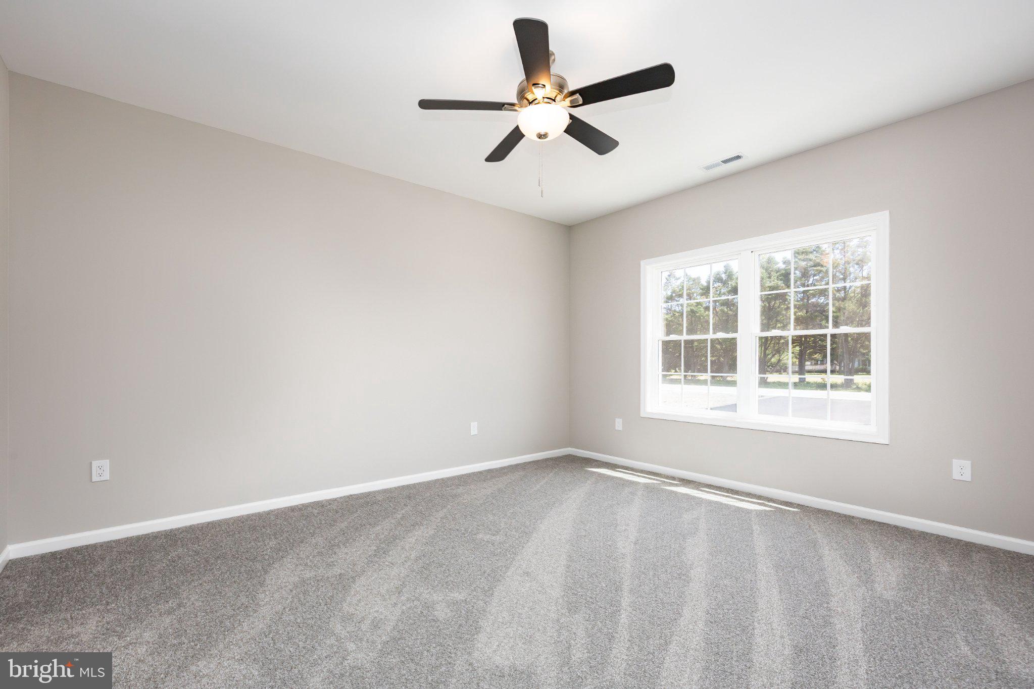 14949 Shiloh Church Road Laurel, DE 19956 - Photo 14 of 32 a view of an empty room with a window