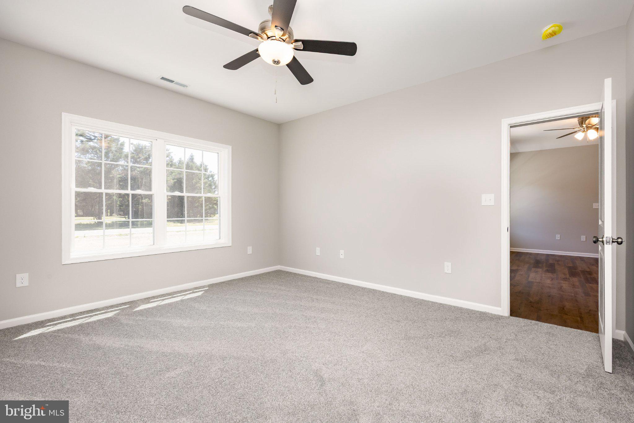 14949 Shiloh Church Road Laurel, DE 19956 - Photo 15 of 32 a view of an empty room with a window