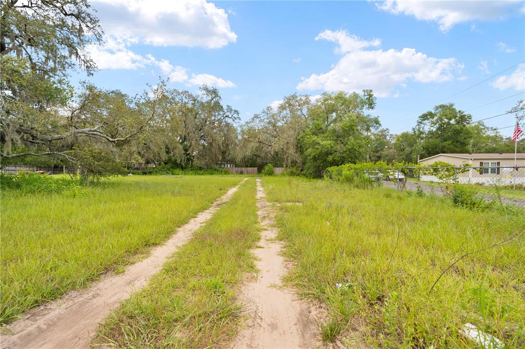 16710 Monteverde Drive Spring Hill, FL 34610 - Photo 16 of 16 a view of an outdoor space and swimming pool