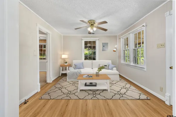 a kitchen with stainless steel appliances granite countertop a sink and a stove