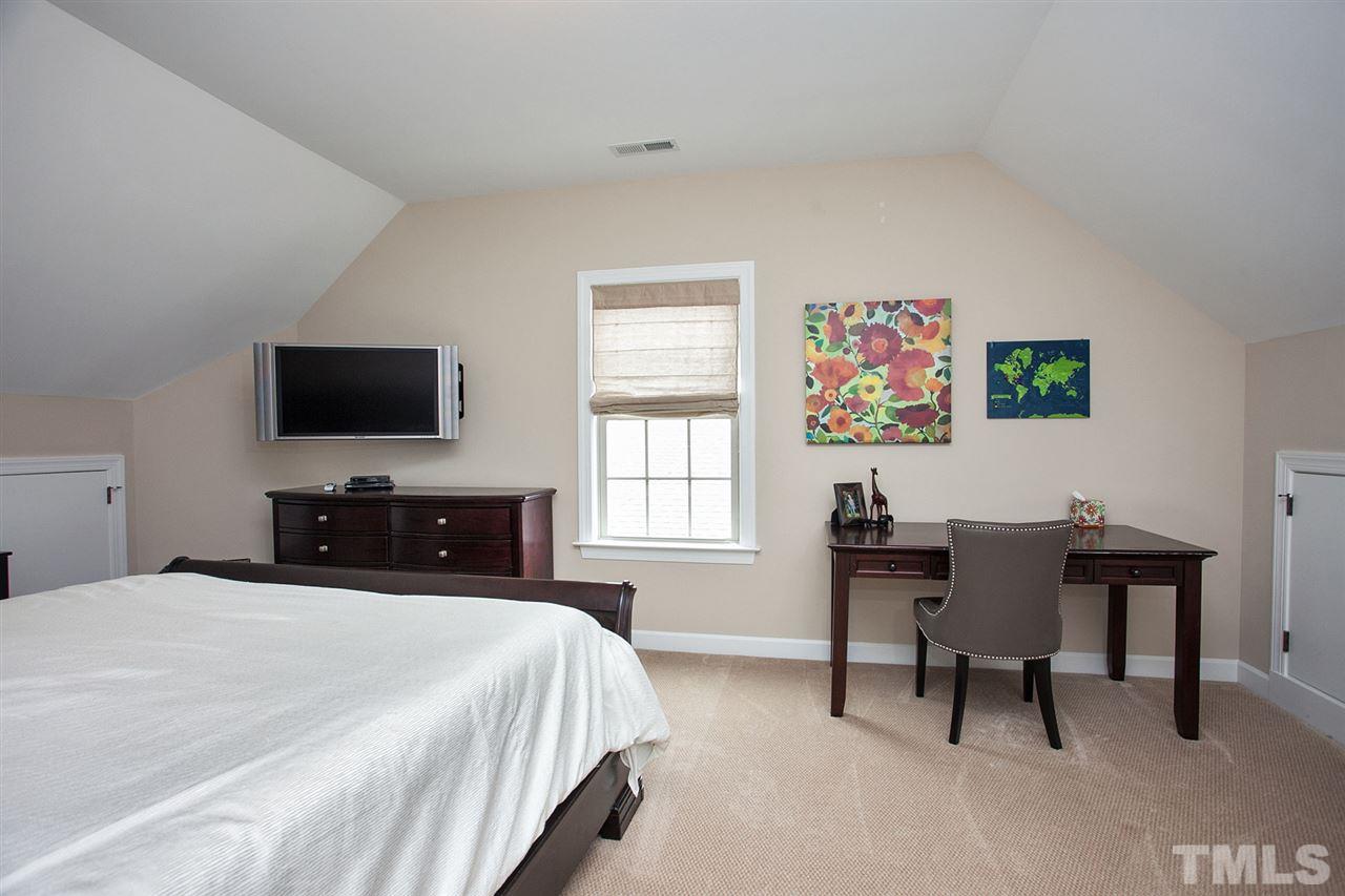 11818 Lowery Ridge Drive Raleigh, NC 27614 - Photo 21 of 25 In addition to a full bed/bath on the first level for guests, this home also offers a huge flex room/bedroom (no closet) with attached bathroom on the 3rd floor.