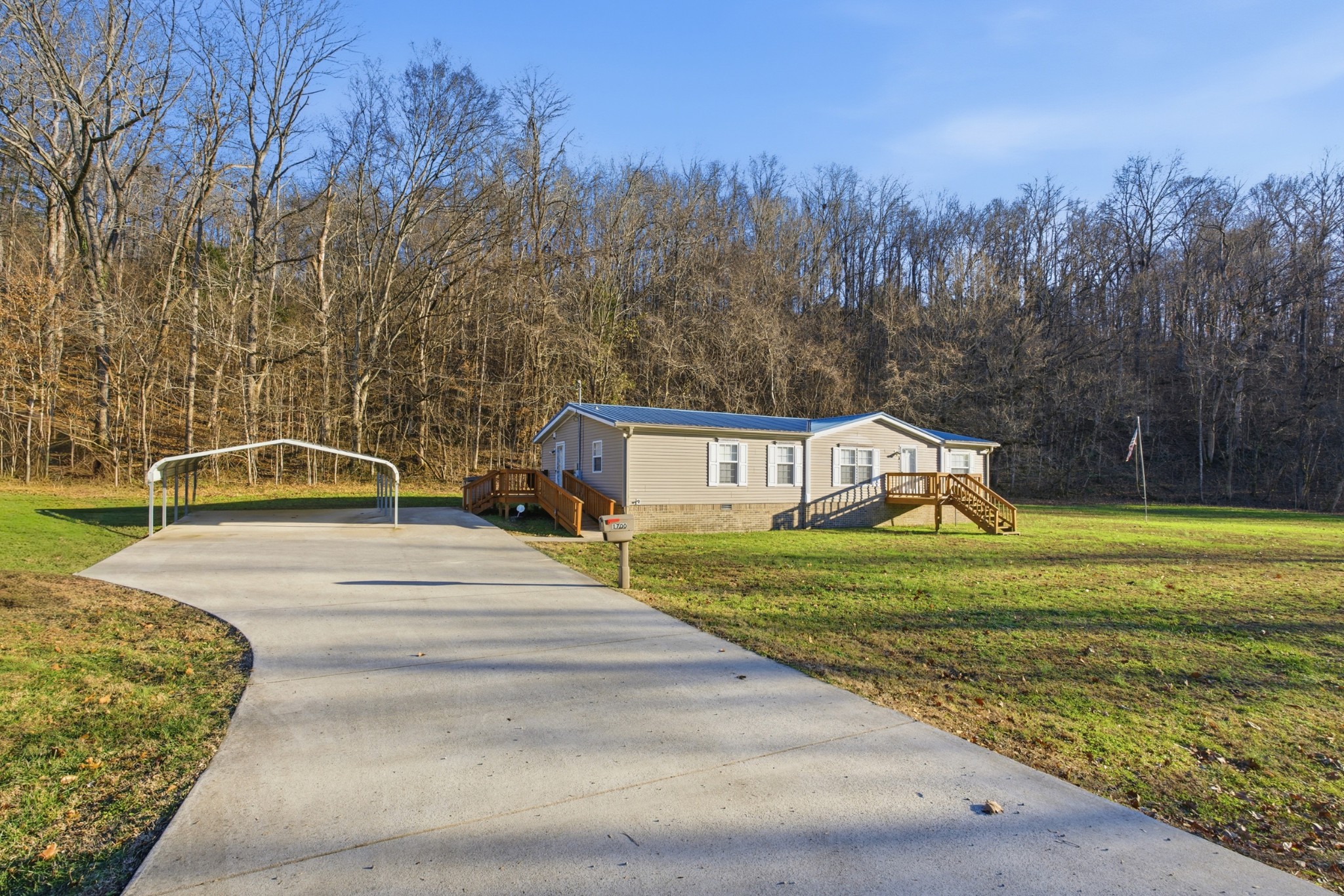 1700 Cumberland Valley Road Erin, TN 37061 - Photo 2 of 24 a view of a house with a yard
