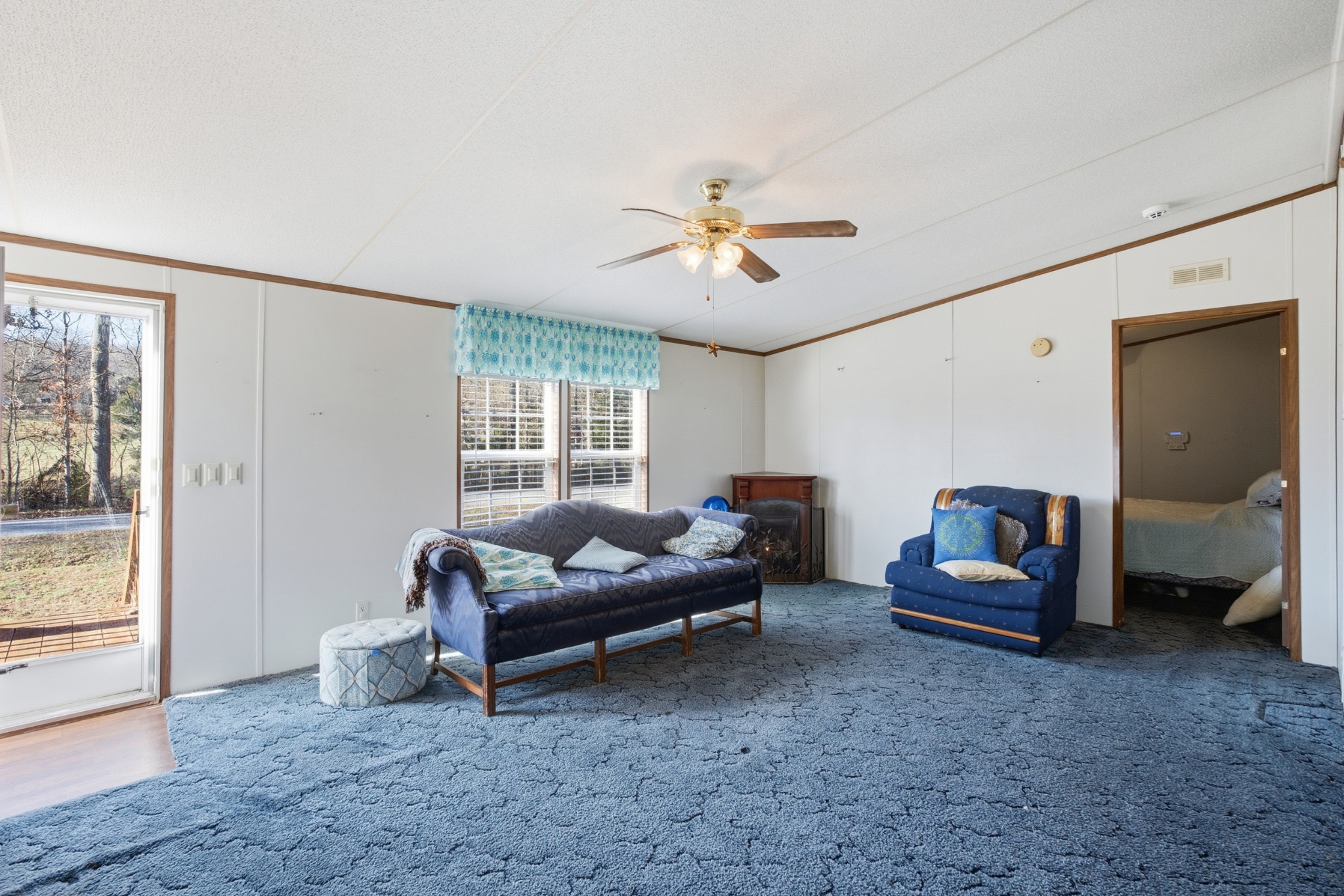 1700 Cumberland Valley Road Erin, TN 37061 - Photo 9 of 24 a living room with furniture and a window