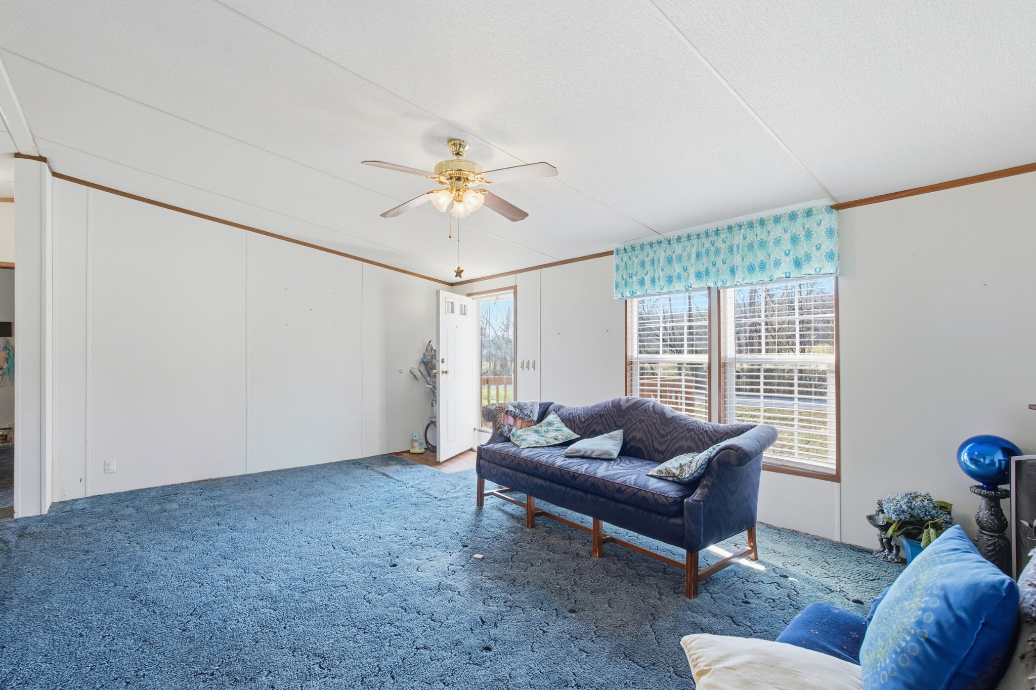 1700 Cumberland Valley Road Erin, TN 37061 - Photo 10 of 24 a living room with furniture and a large window