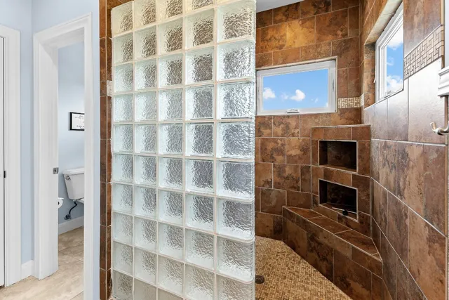 a bathroom with a sink and a shower