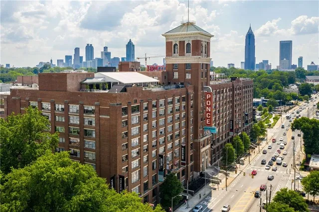 a view of a yard next to a building