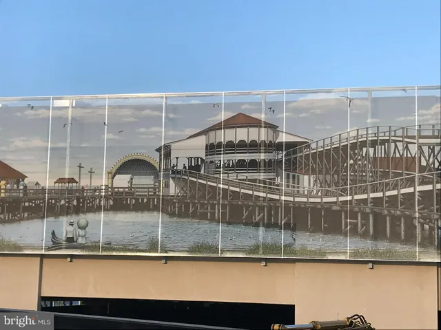 a view of a balcony with a floor to ceiling window