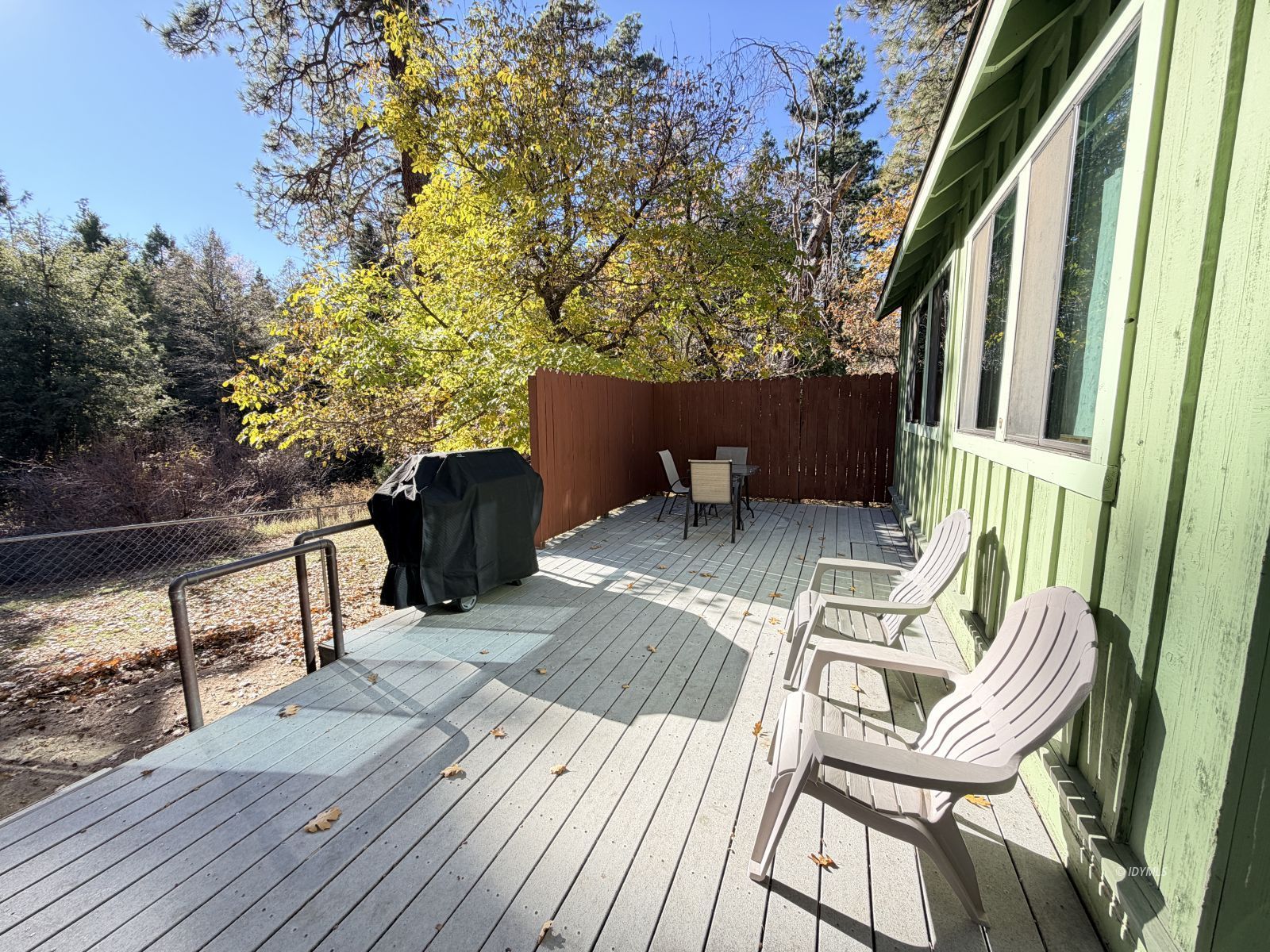54059 Montgomery Idyllwild, CA 92549 - Photo 19 of 24 a view of balcony with wooden floor and outdoor seating
