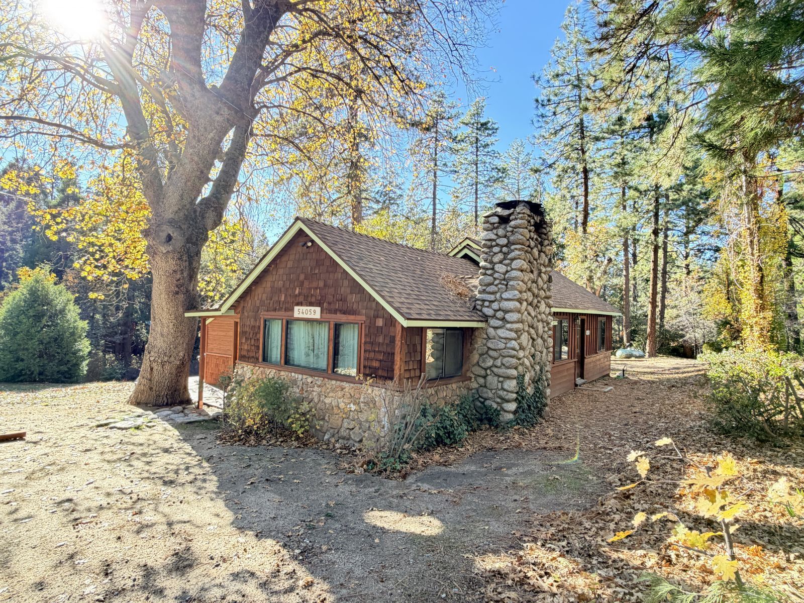 54059 Montgomery Idyllwild, CA 92549 - Photo 2 of 24 a view of a house with a yard