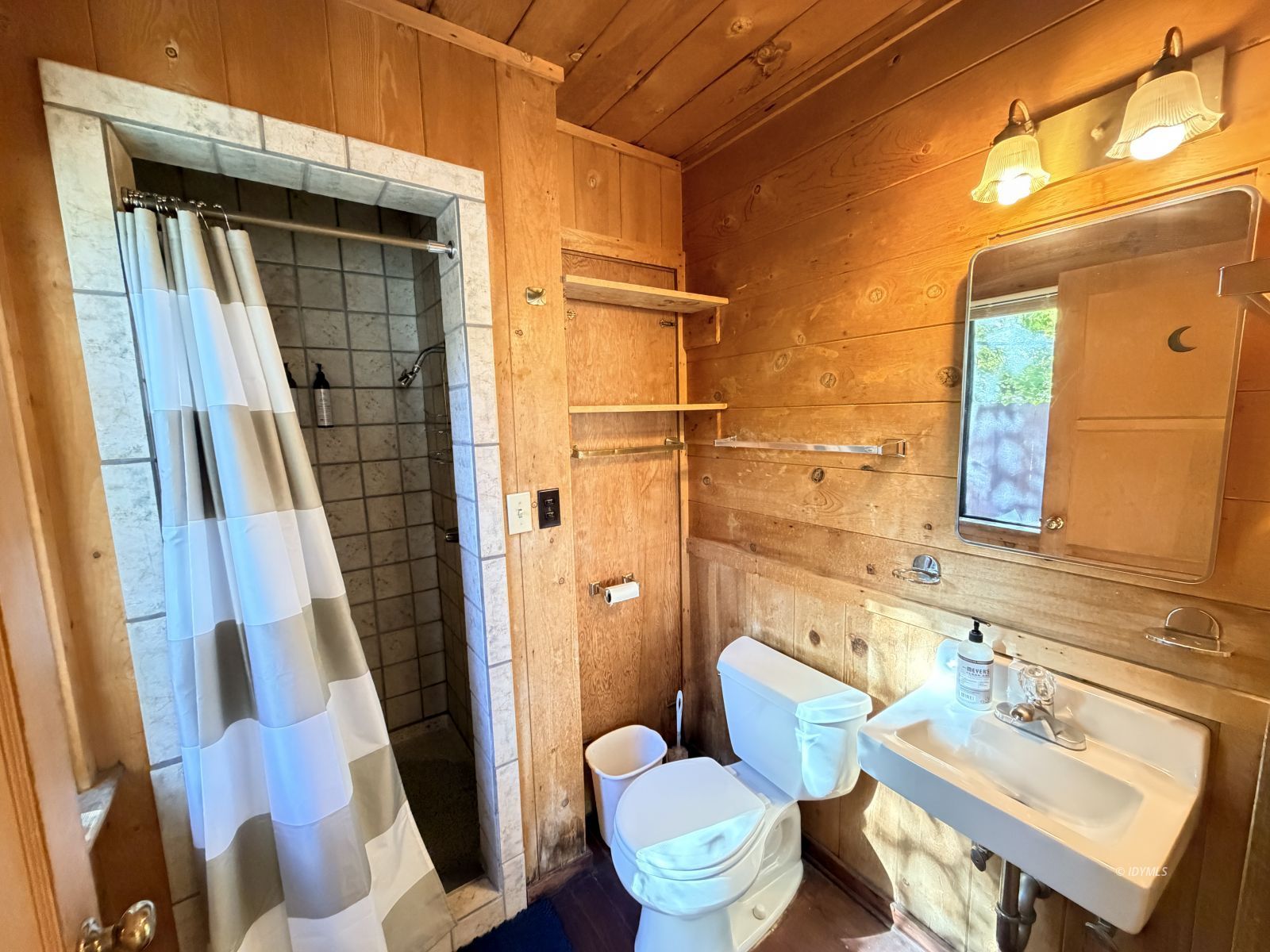 54059 Montgomery Idyllwild, CA 92549 - Photo 10 of 24 a bathroom with a toilet sink and shower