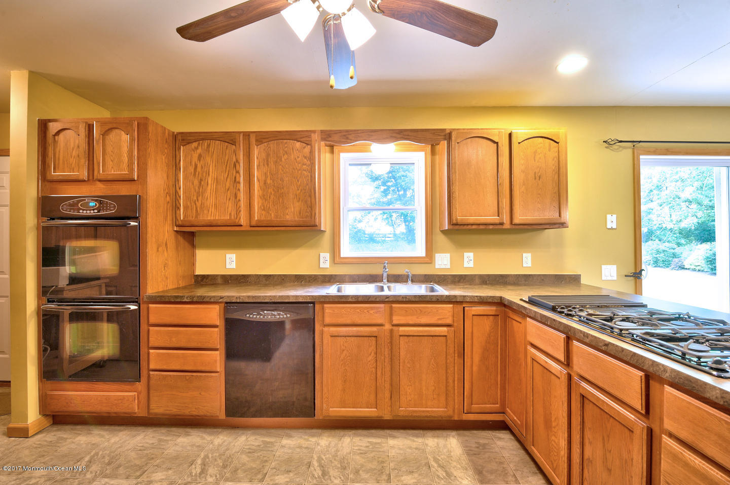 274 Trenton Lakewood Road Cream Ridge, NJ 08514 - Photo 13 of 31 a kitchen with stainless steel appliances granite countertop a stove a sink and a refrigerator