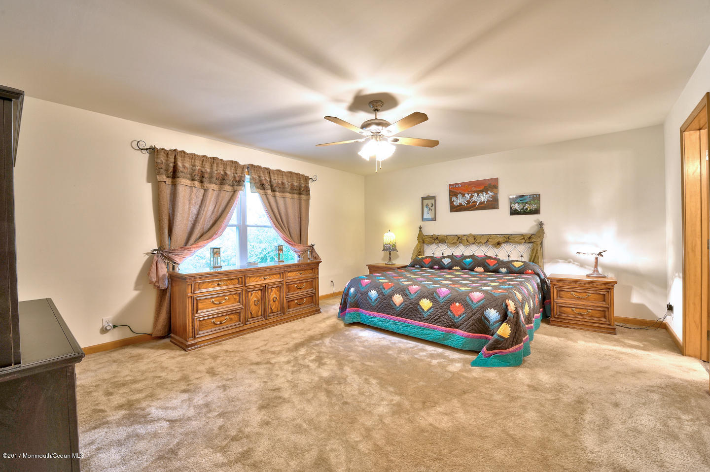 274 Trenton Lakewood Road Cream Ridge, NJ 08514 - Photo 18 of 31 a bedroom with a bed and a window