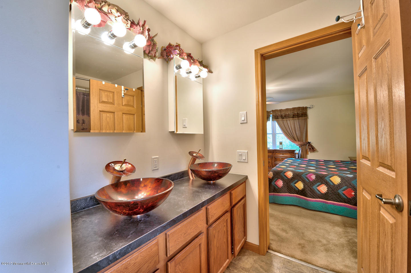 274 Trenton Lakewood Road Cream Ridge, NJ 08514 - Photo 22 of 31 a bathroom with a sink and a mirror