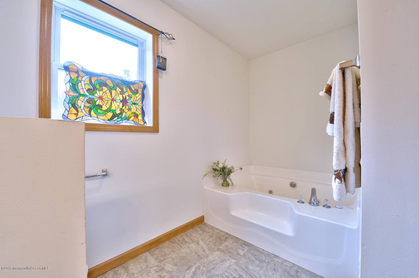 274 Trenton Lakewood Road Cream Ridge, NJ 08514 - Photo 23 of 31 a bathroom with a bathtub and a sink