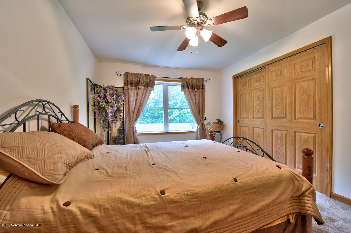 274 Trenton Lakewood Road Cream Ridge, NJ 08514 - Photo 25 of 31 a bedroom with a bed and a window