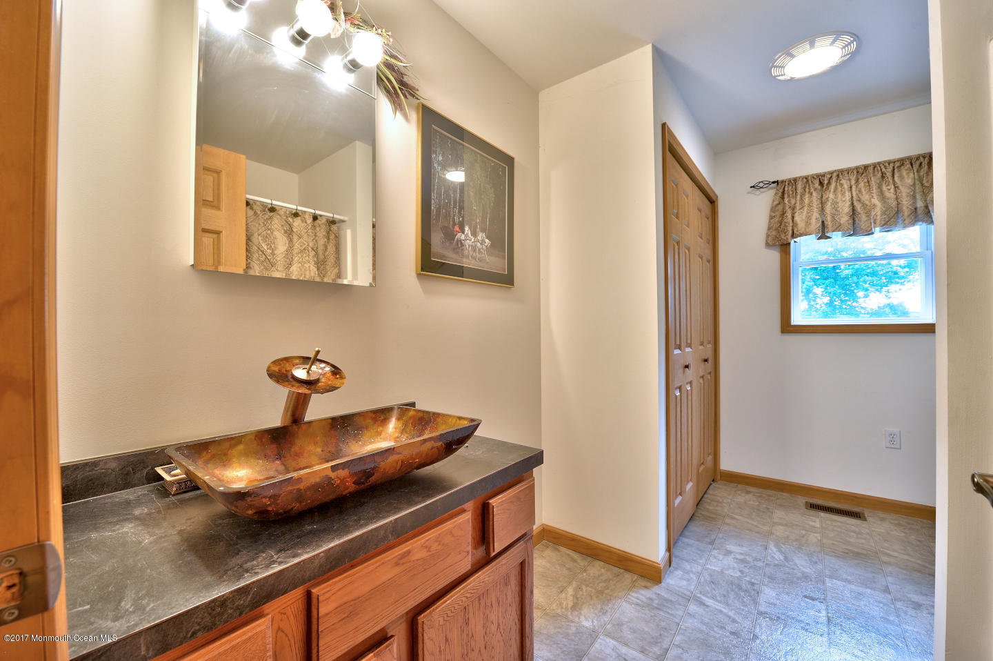 274 Trenton Lakewood Road Cream Ridge, NJ 08514 - Photo 28 of 31 a kitchen with a sink and a stove