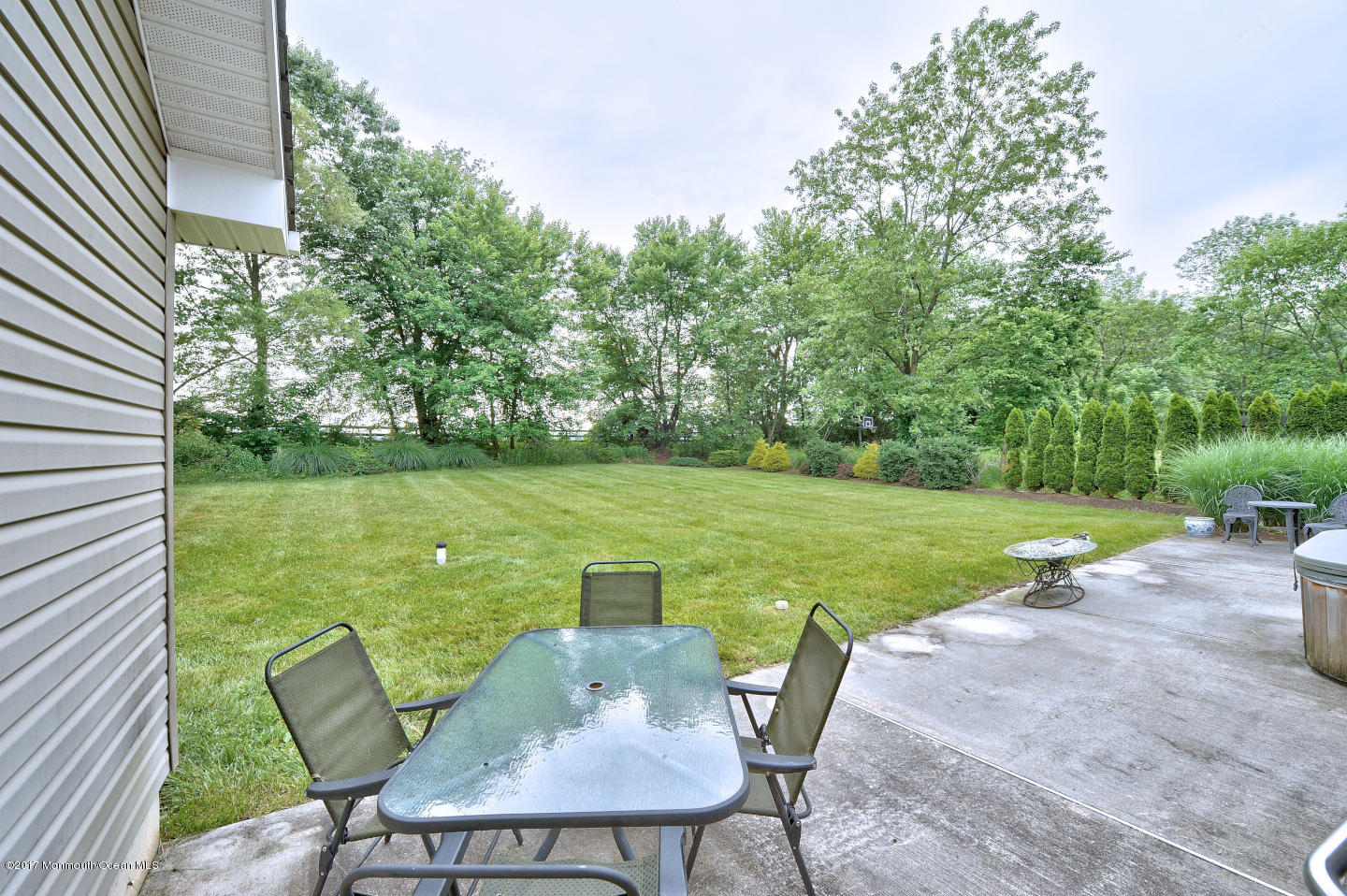 274 Trenton Lakewood Road Cream Ridge, NJ 08514 - Photo 30 of 31 a view of a chair and table on the garden