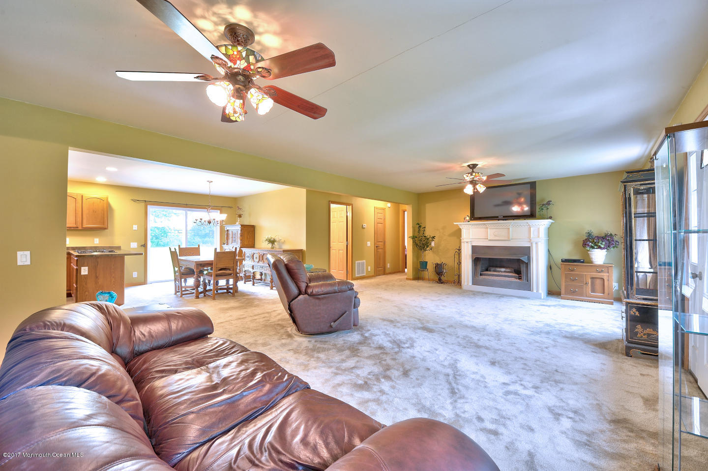 274 Trenton Lakewood Road Cream Ridge, NJ 08514 - Photo 7 of 31 a living room with furniture and a fireplace