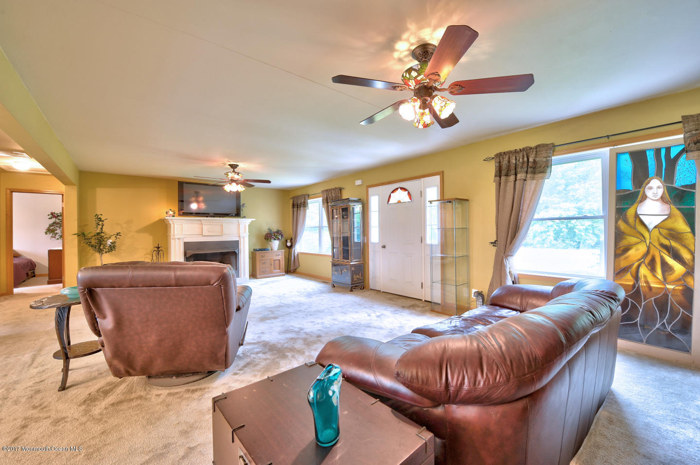 274 Trenton Lakewood Road Cream Ridge, NJ 08514 - Photo 8 of 31 a living room with furniture and a large window